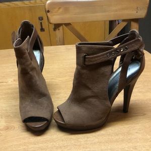 Tan sueded women’s heels with ankle buckle
